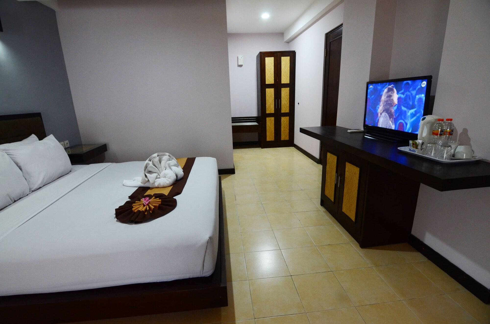 Grand Santhi Hotel Denpasar Extérieur photo