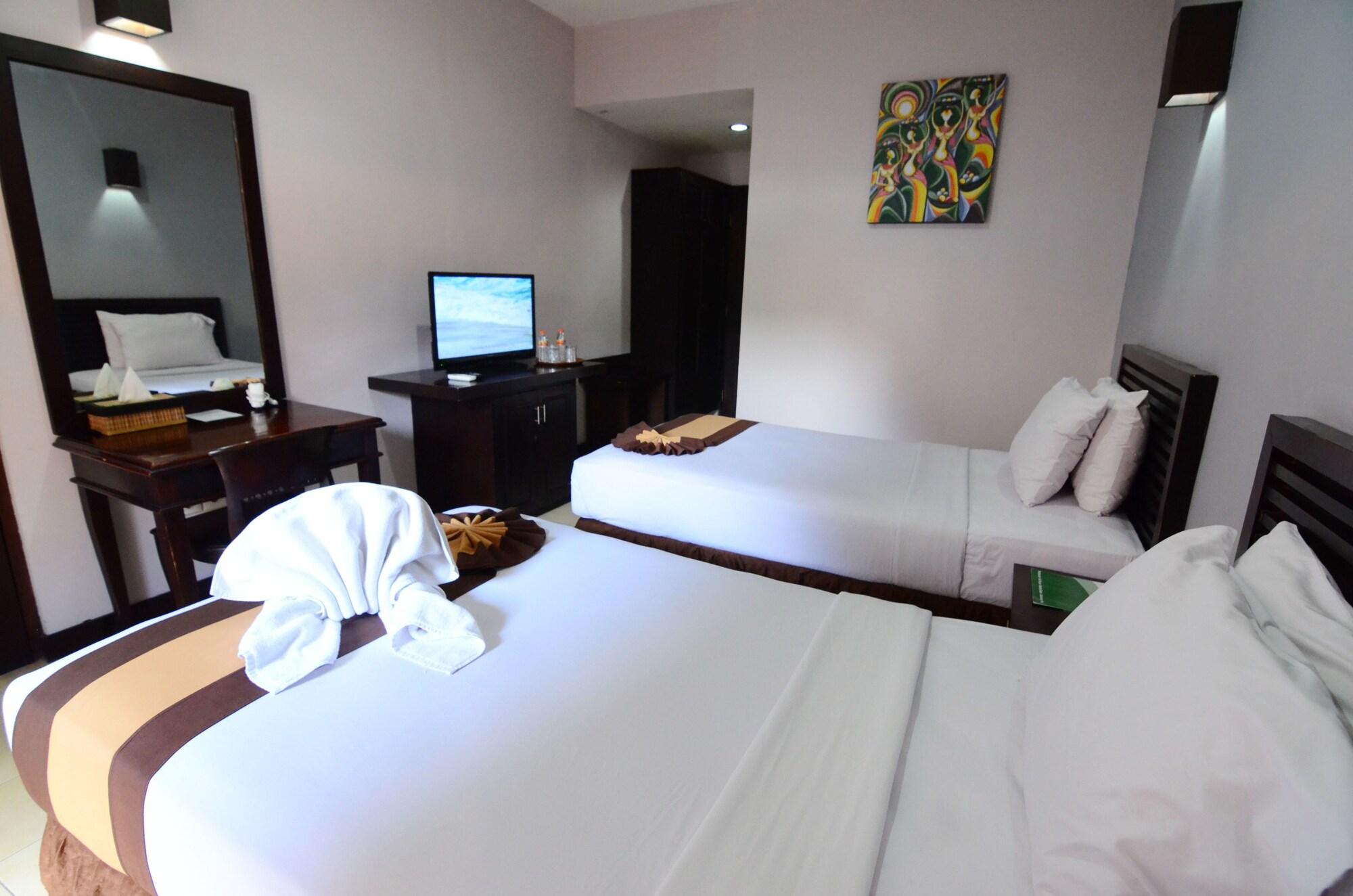 Grand Santhi Hotel Denpasar Extérieur photo