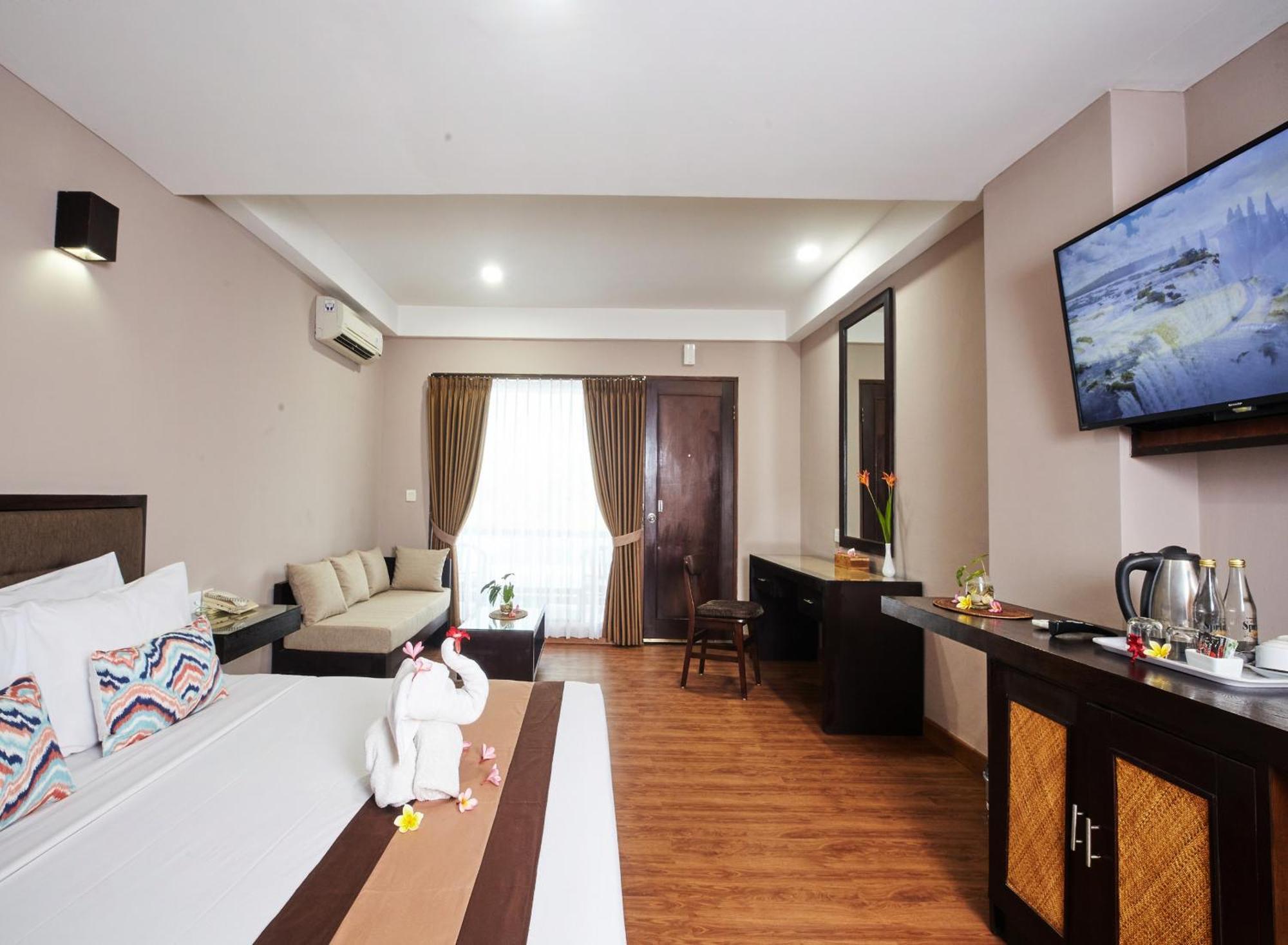 Grand Santhi Hotel Denpasar Extérieur photo